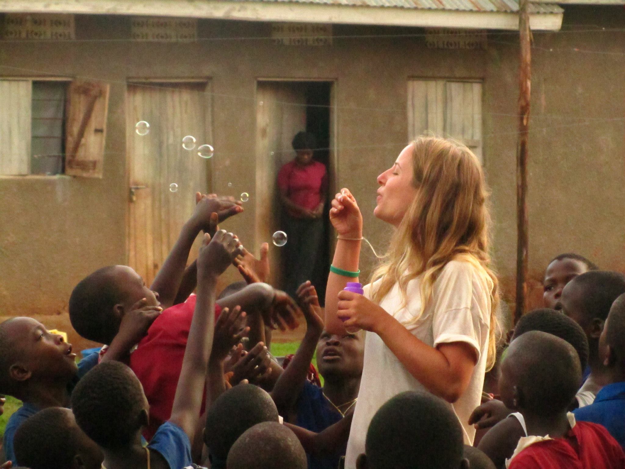 Gap Year Africa - blowing bubbles with African children