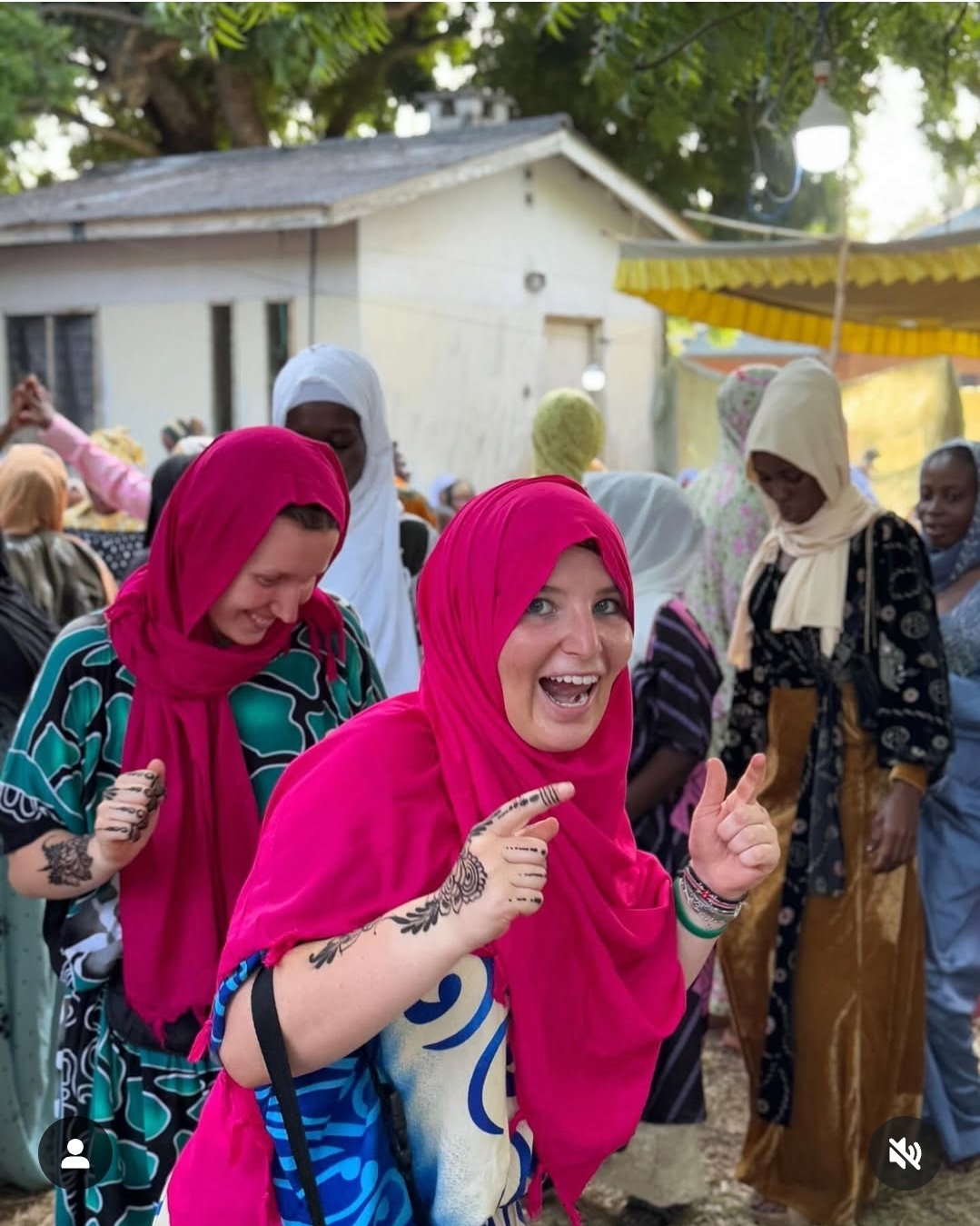 Gap Year Students dressed in local dress for a wedding